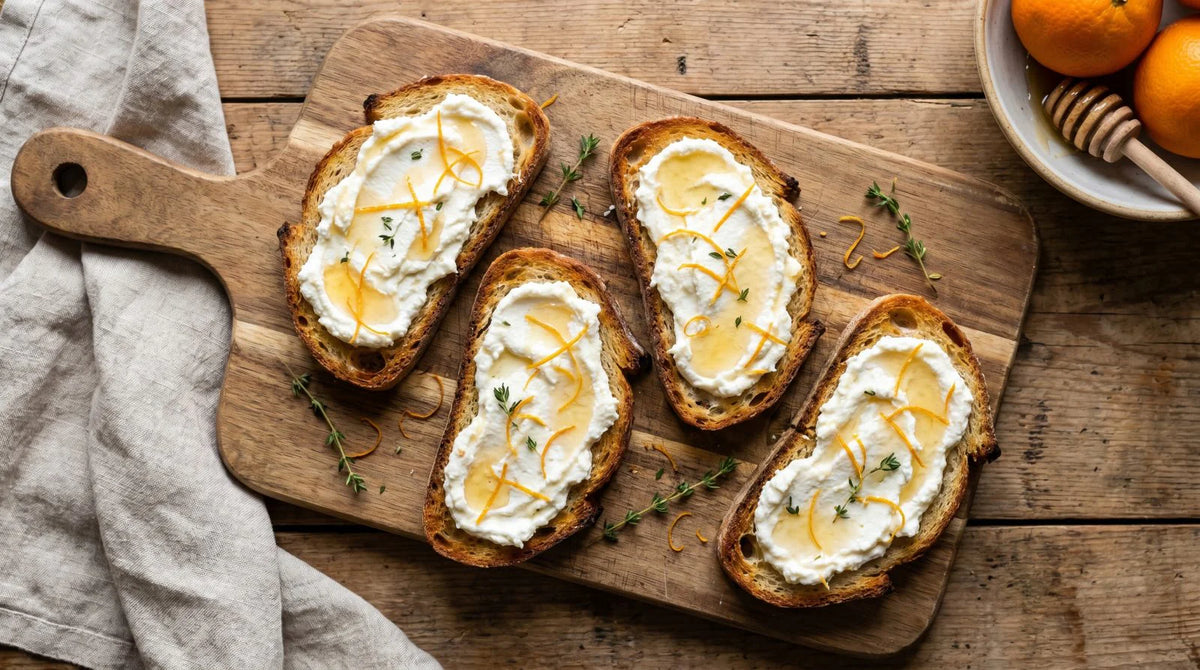 Bruschette con ricotta, scorza d'arancia e miele